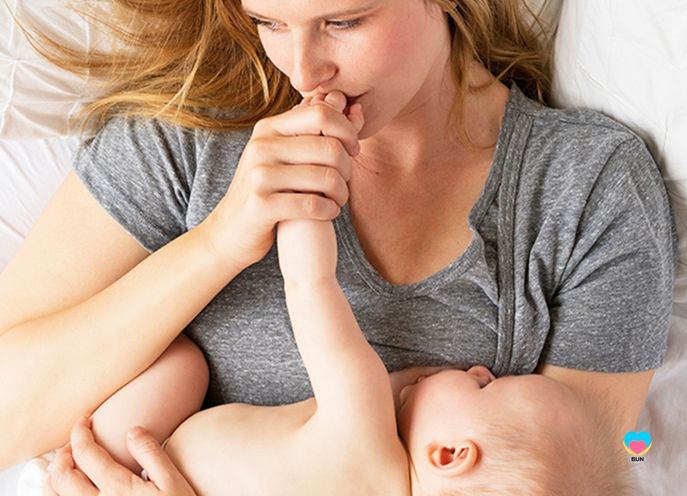 mom breastfeeding wearing bun materinity nursing tee shirt